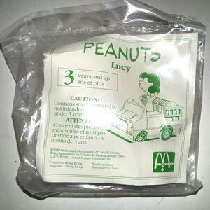 NIB Vtg McDonald's Peanuts Lucy Toy with Green and Firetruck Design